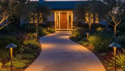 Evening walkway lighting design by Chop Chop Landscaping in San Diego, CA enhances safety and curb appeal